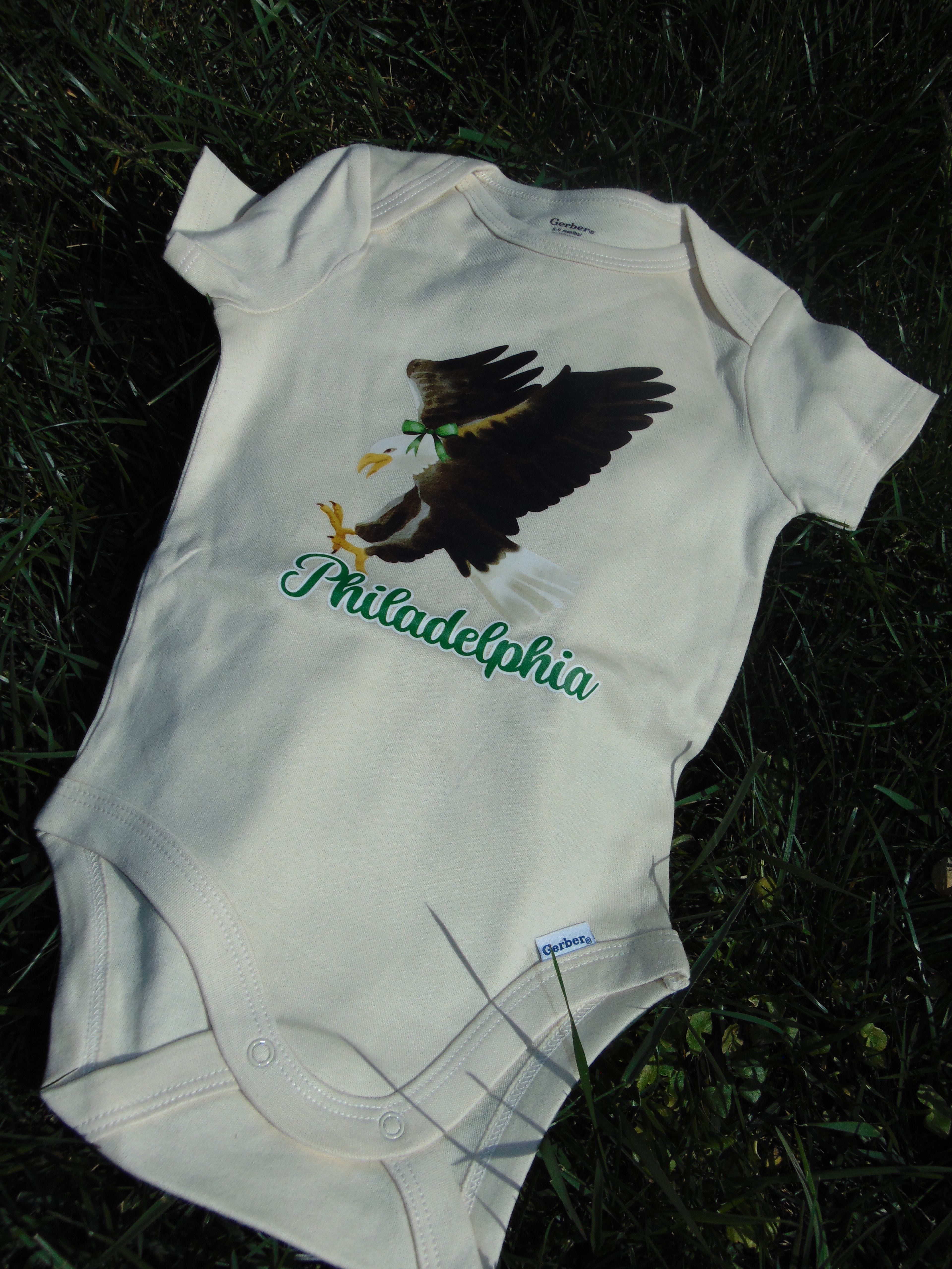 Philadelphia Eagle + Bow Onesie